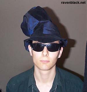 Hat and shades perched on RavenBlack.